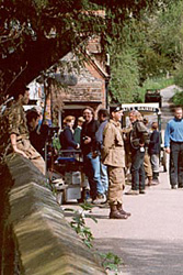 Damian Lewis (centre) who played Cpt Winters, and Ron Livingston (sitting on wall) who played Lt Nixon, waiting for the word 'Action'.